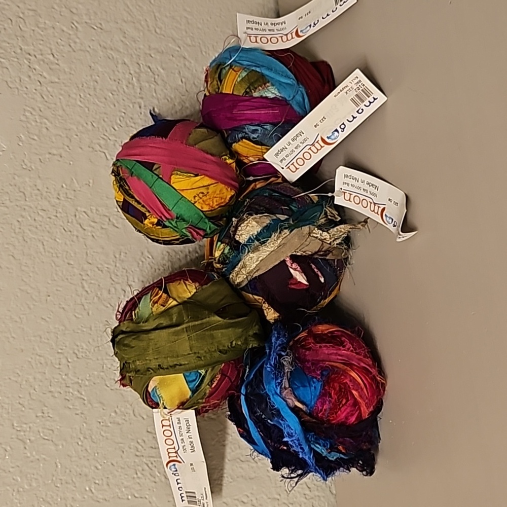 10 recycled Sari silk yarn balls.